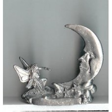 small fairy with moon figurine