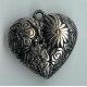 1x nickle antique puffed hearts